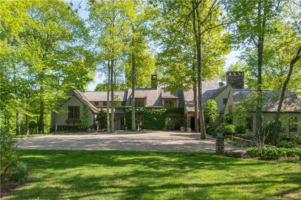 a view of a house with a tree