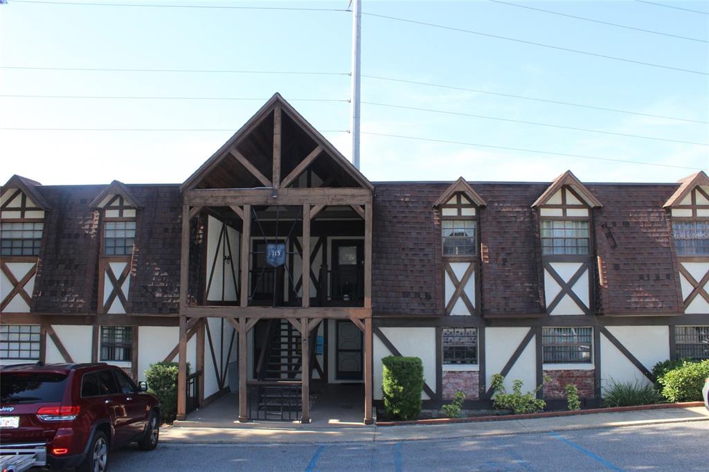 a view of a building with a street