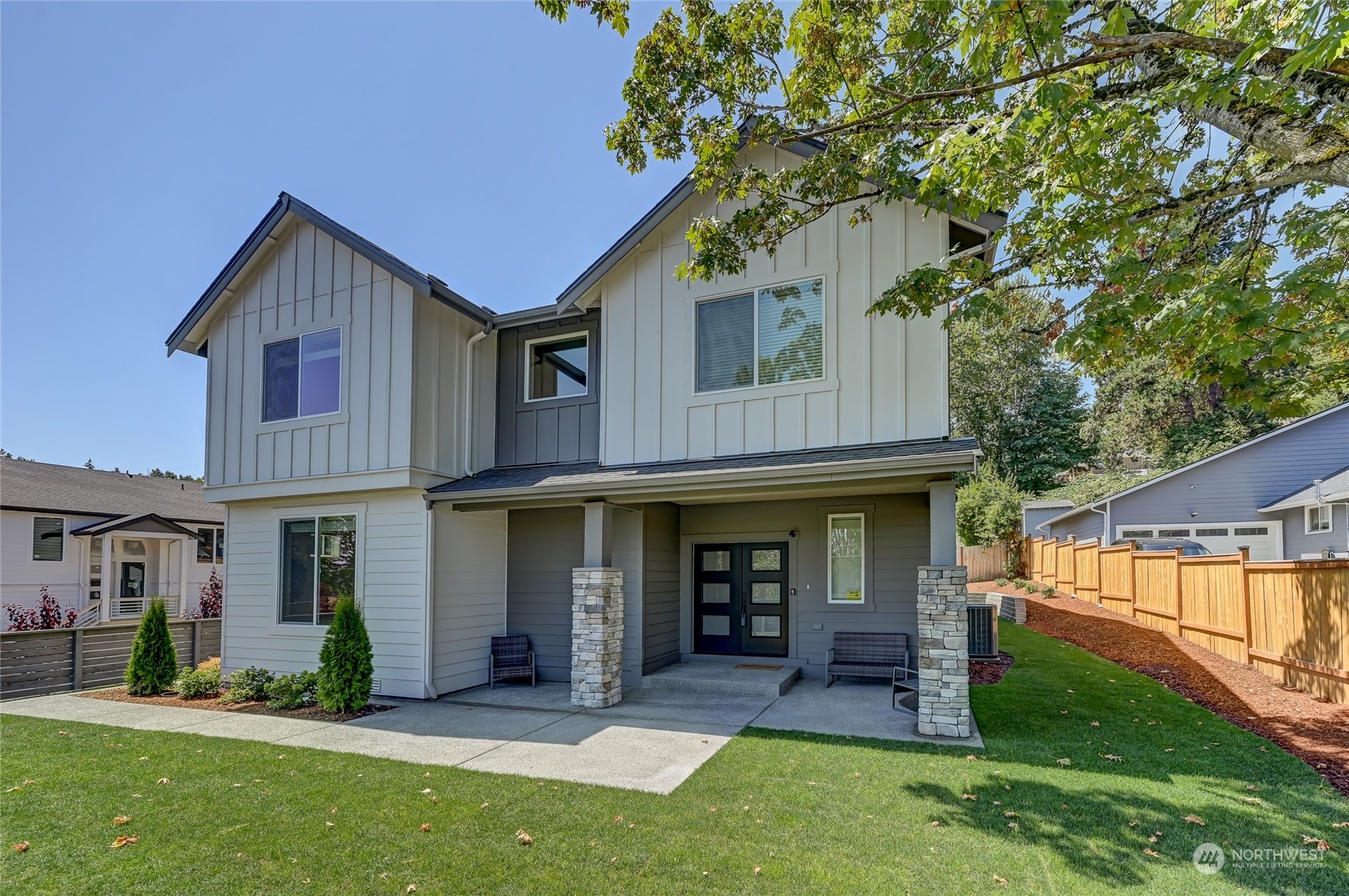 front view of a house with a yard