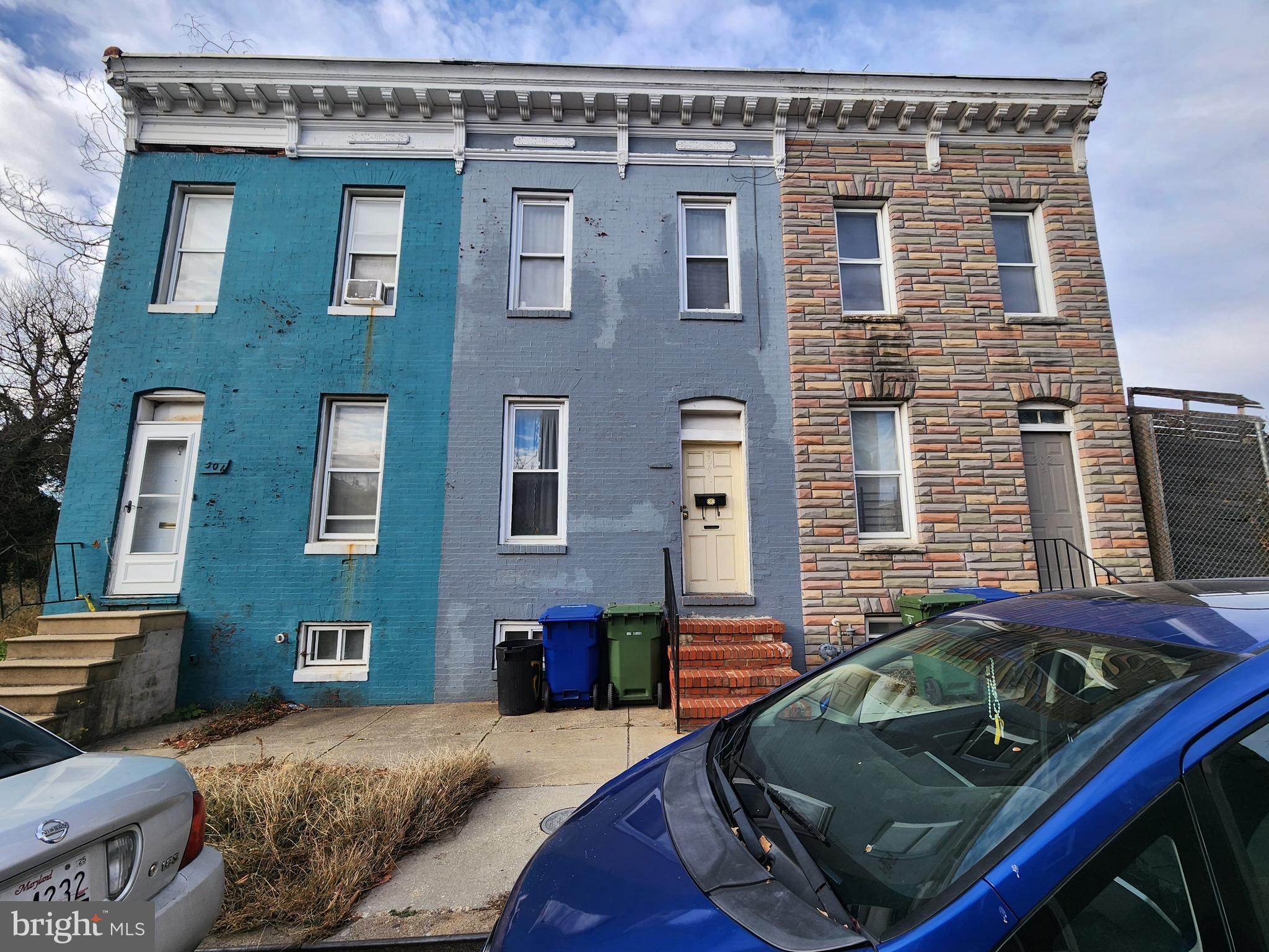 a view of a brick building with many windows