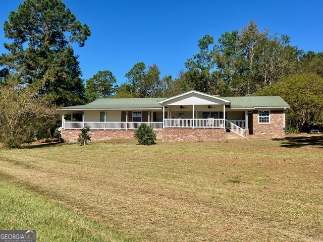 front view of a house with a patio