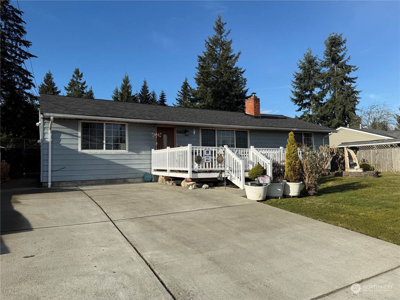 a view of house with outdoor space and porch