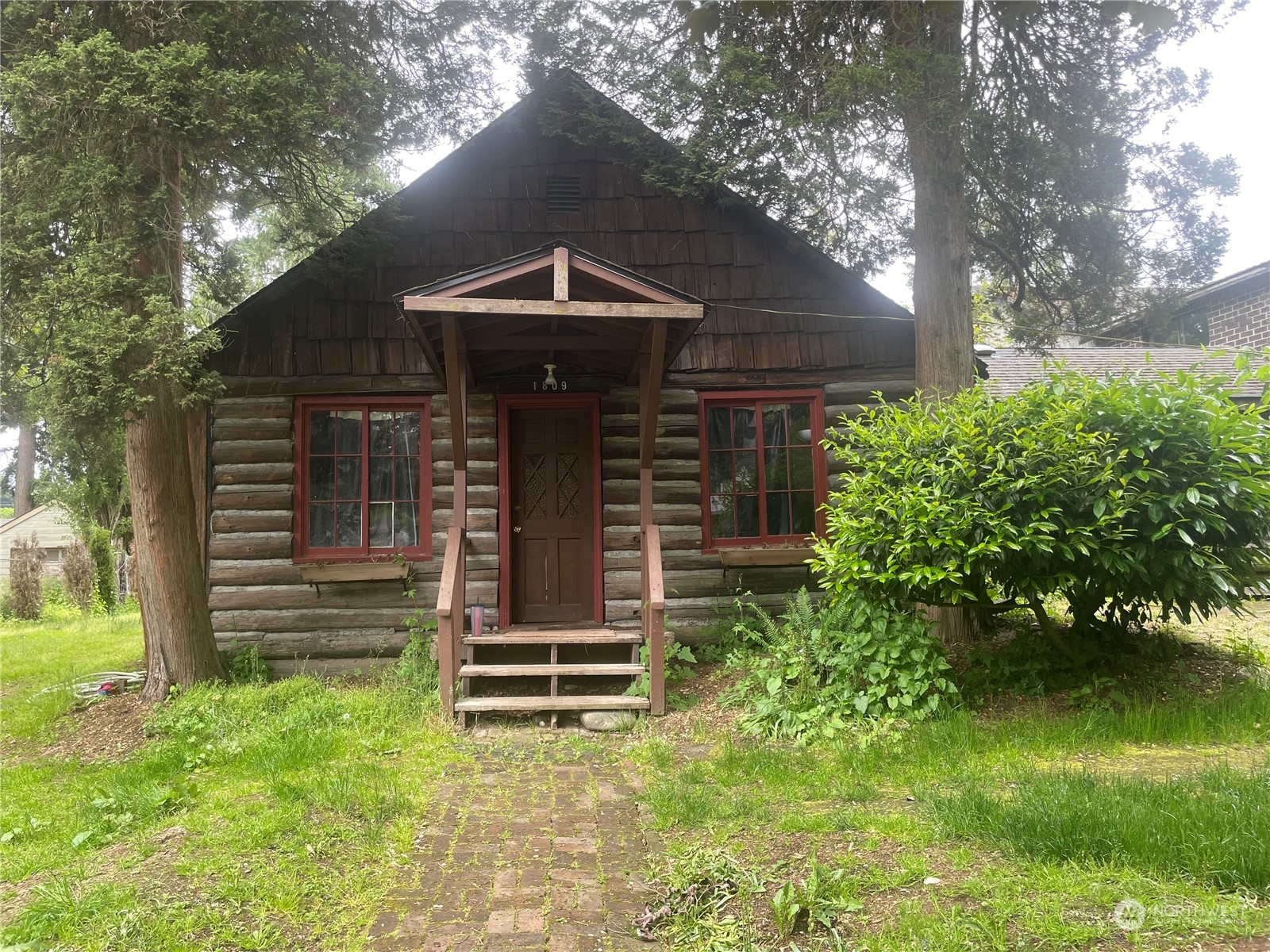 a front view of house with a yard