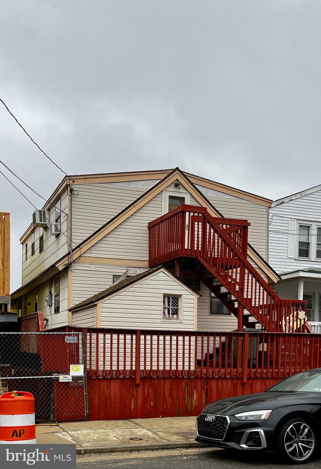 a view of a house with a deck