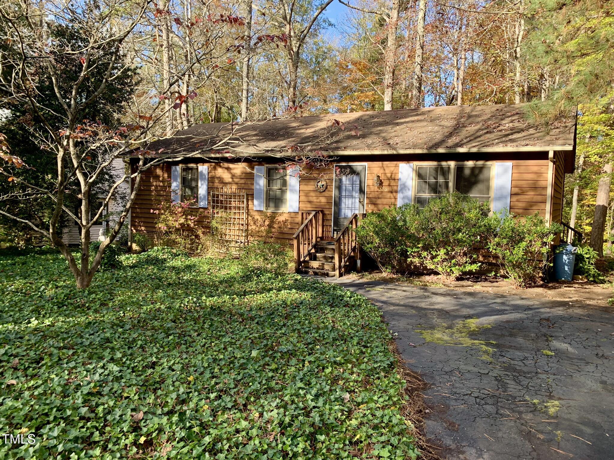 front view of a house with a yard