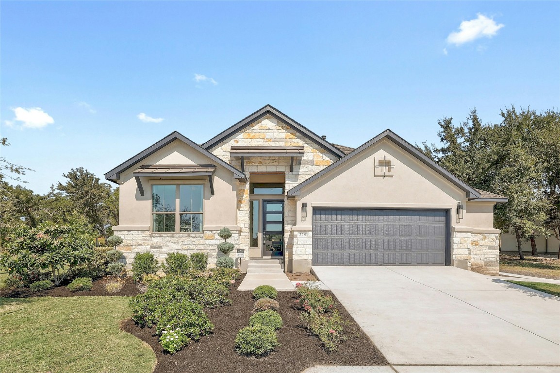 front view of a house with a yard