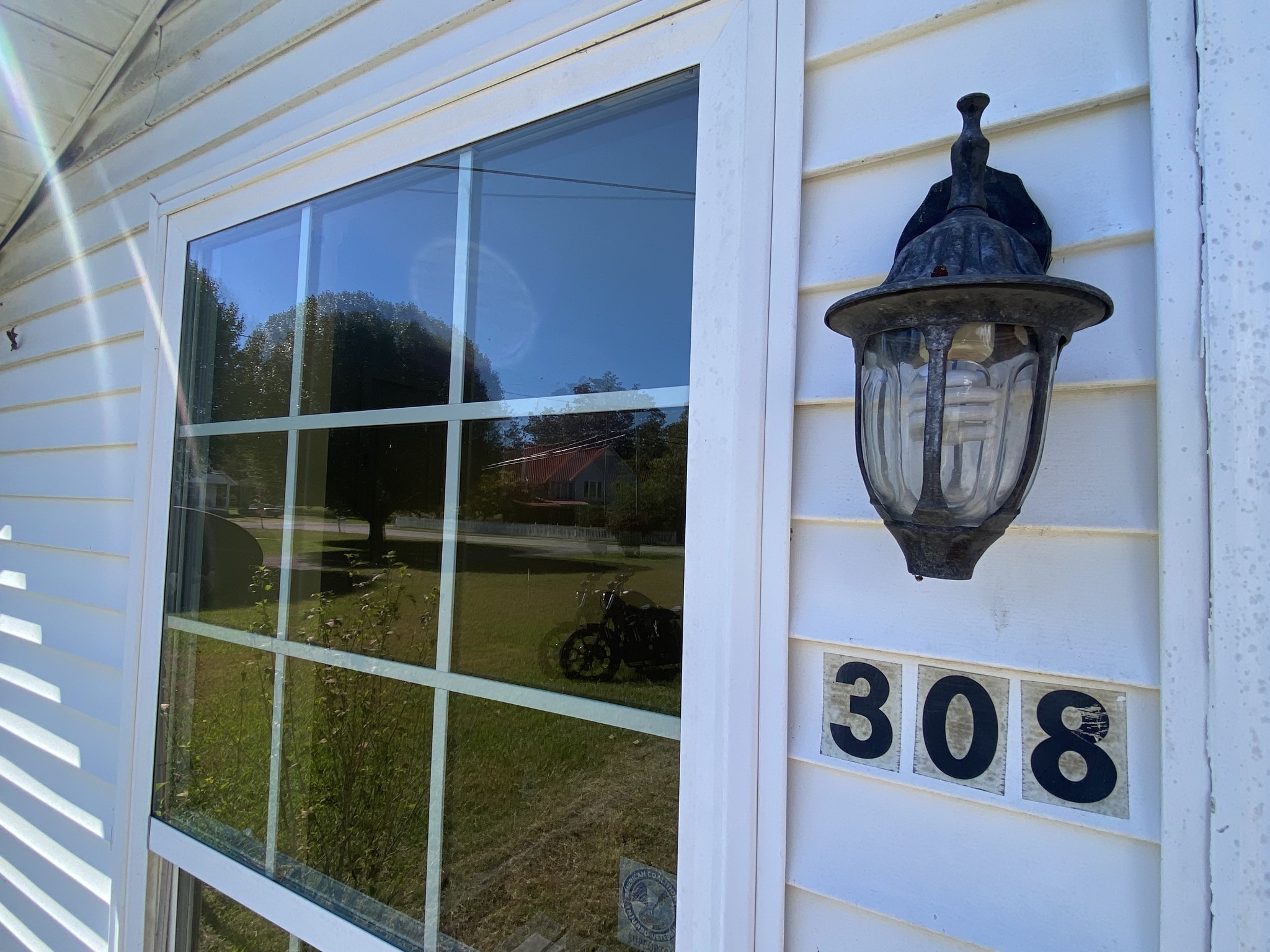 a view of a door and a window