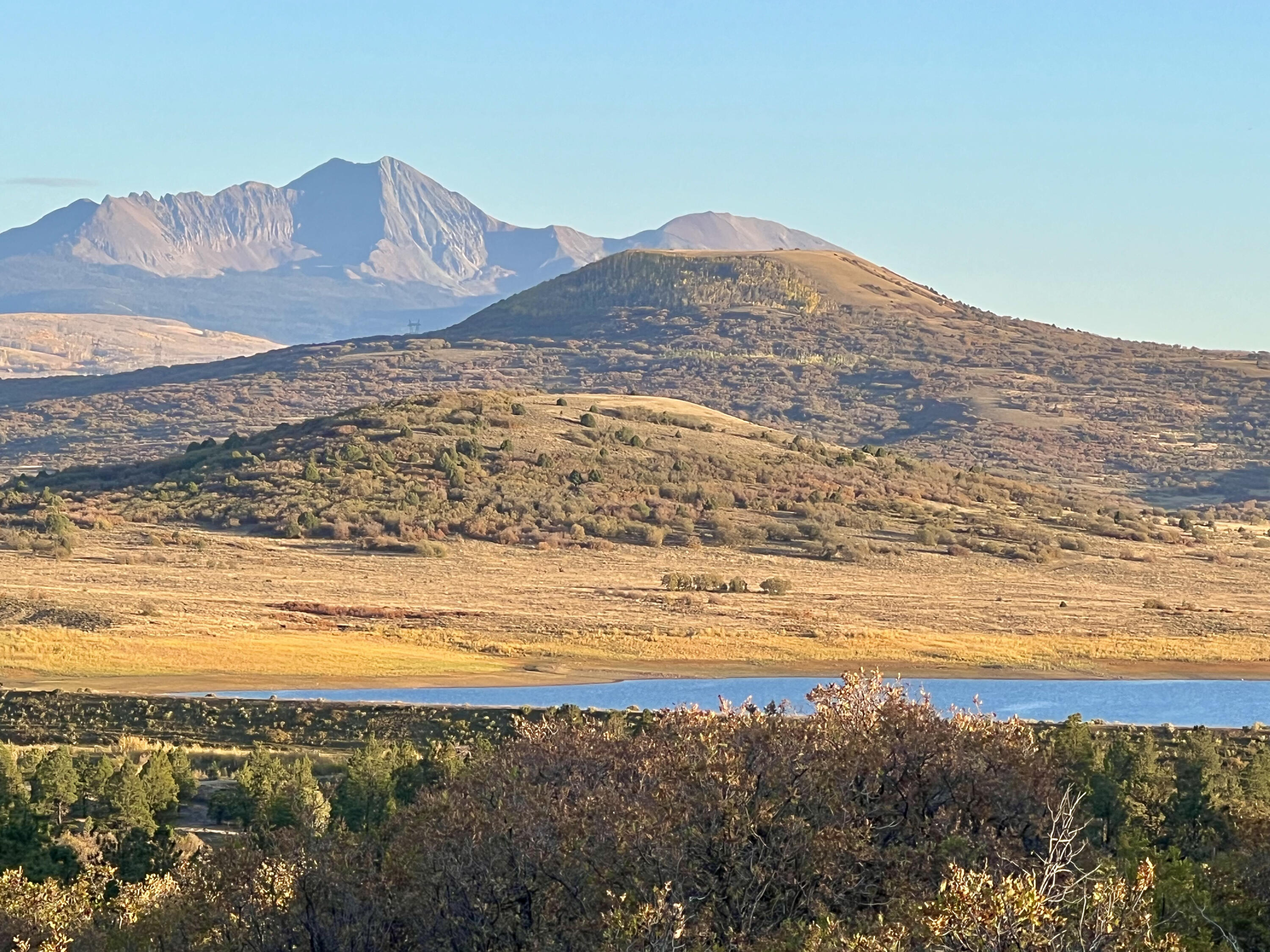 a view of ocean and mountain