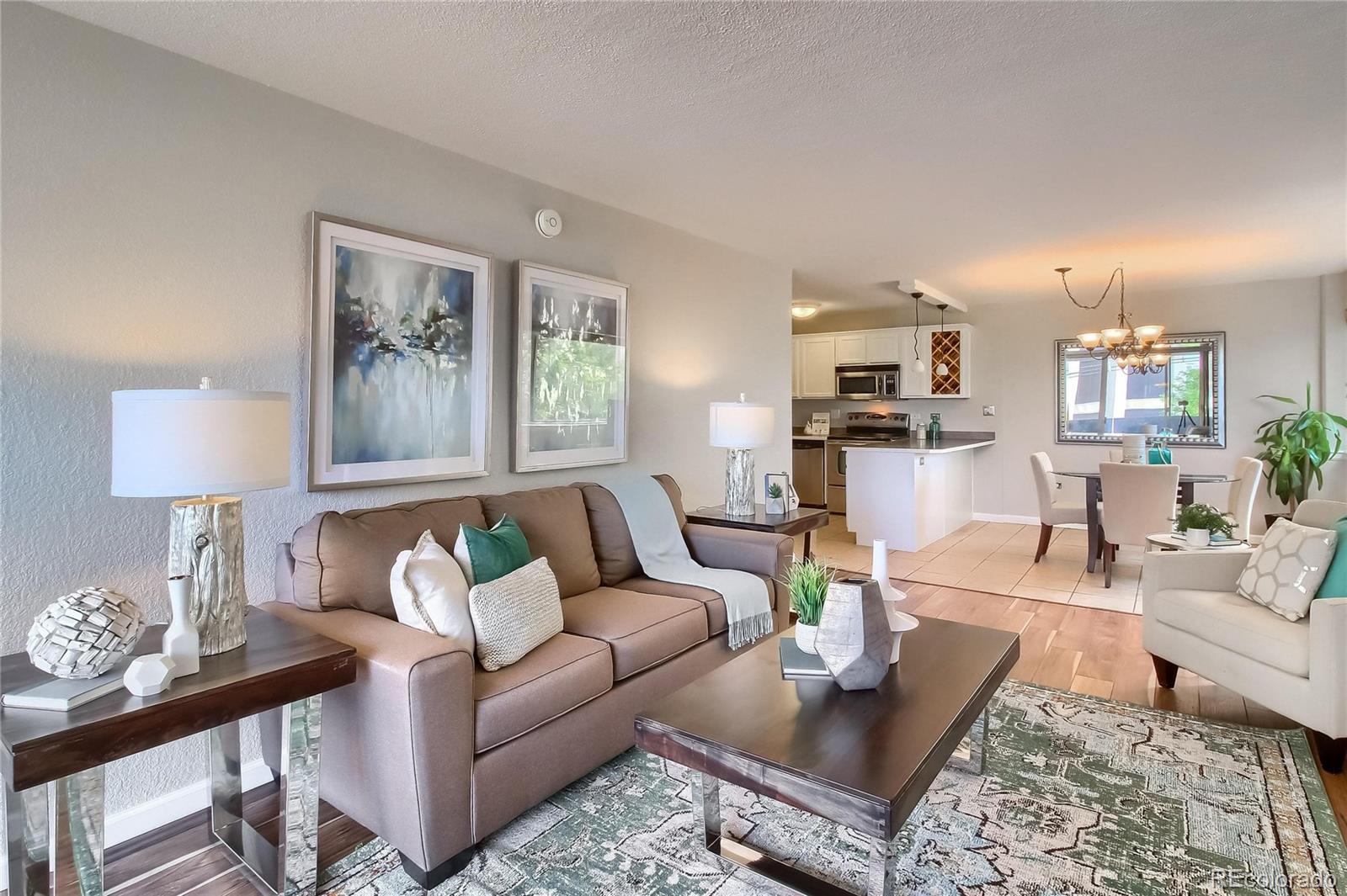 a living room with furniture and a table