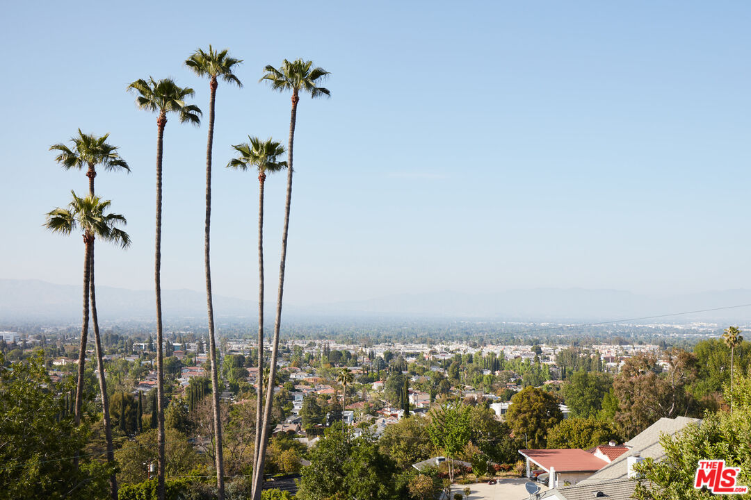 a view of a city with tall buildings