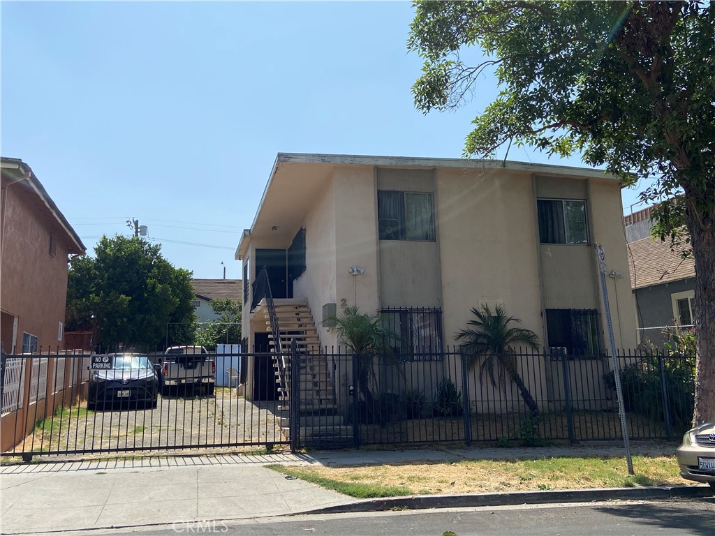 a view of a house with a street