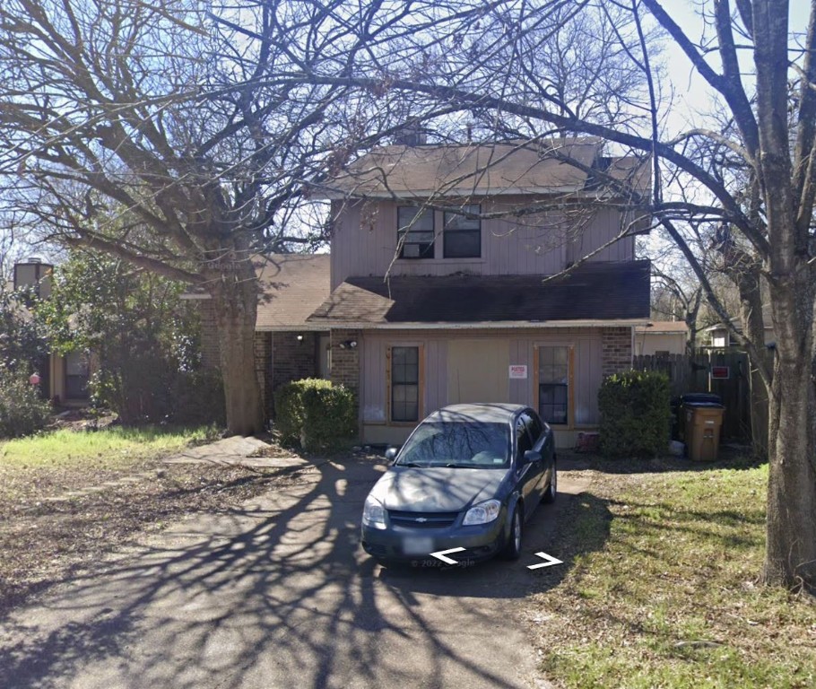 a house view with sitting space and garden space