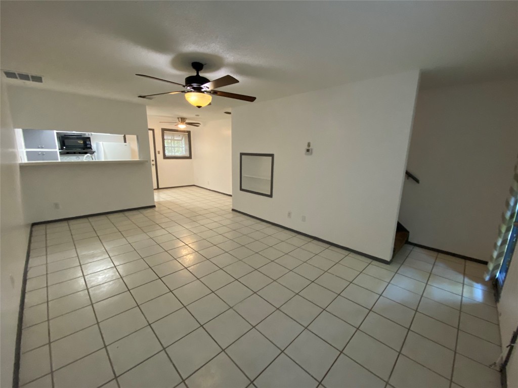 a view of a livingroom with furniture