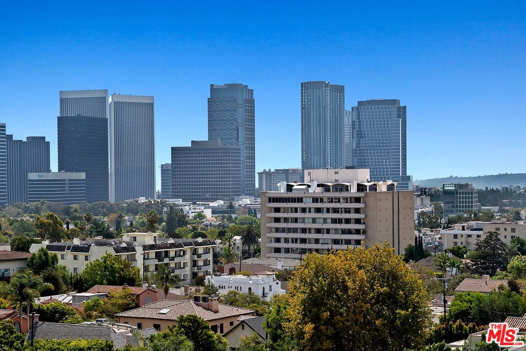 a view of a city with tall buildings