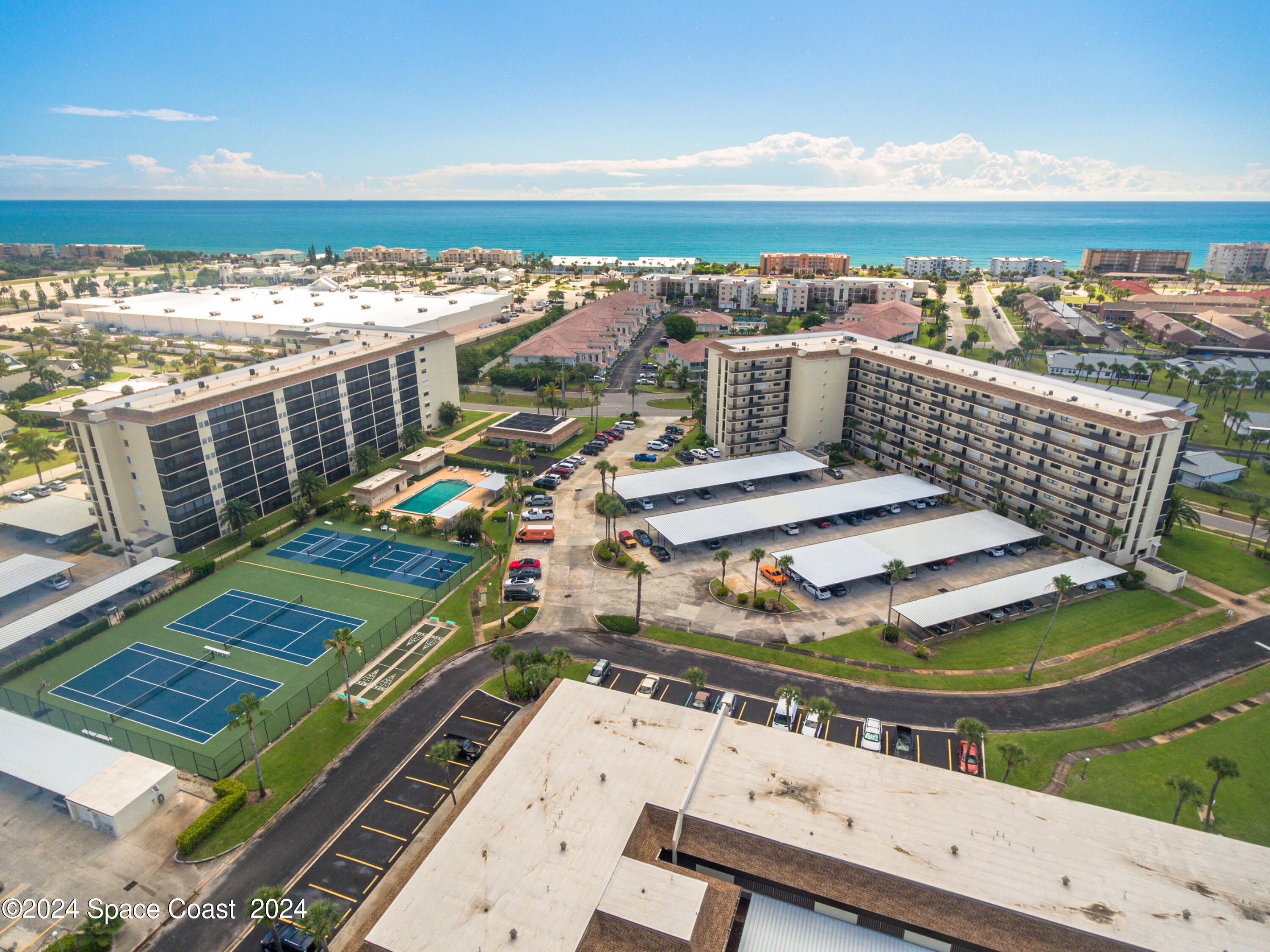 a view of a balcony with an ocean view