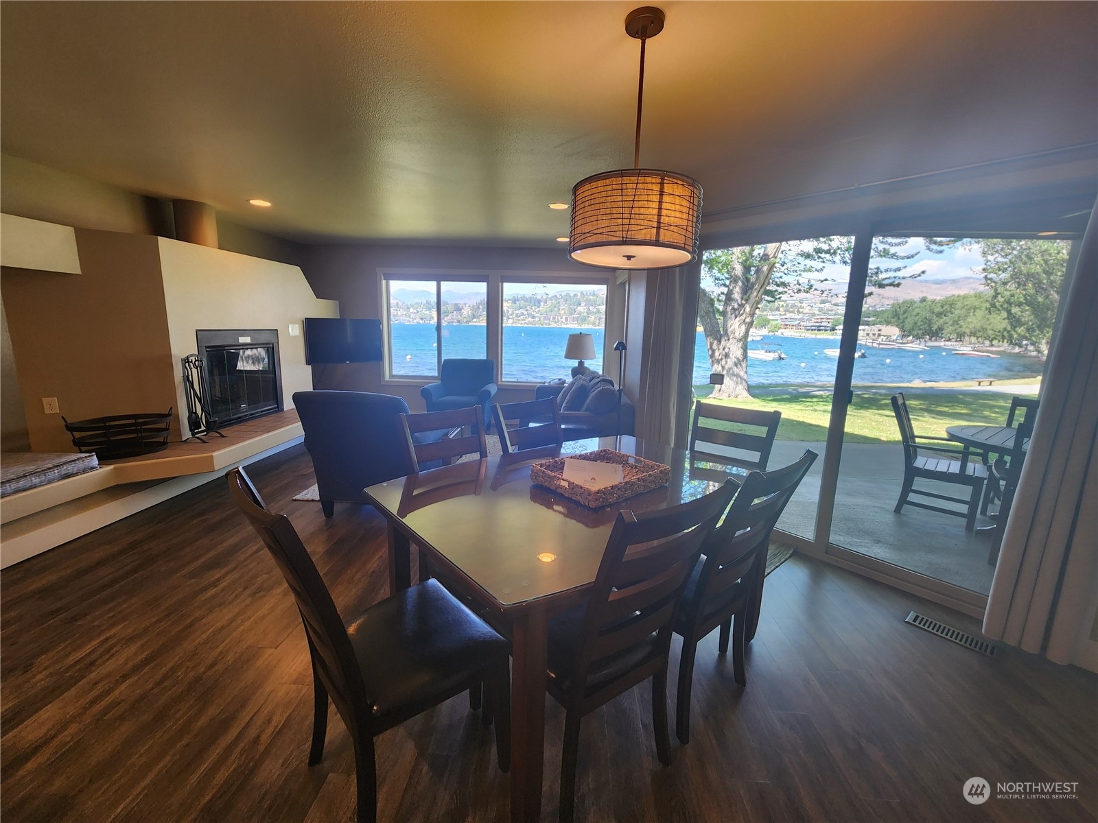 a view of a dining room with furniture window and wooden floor