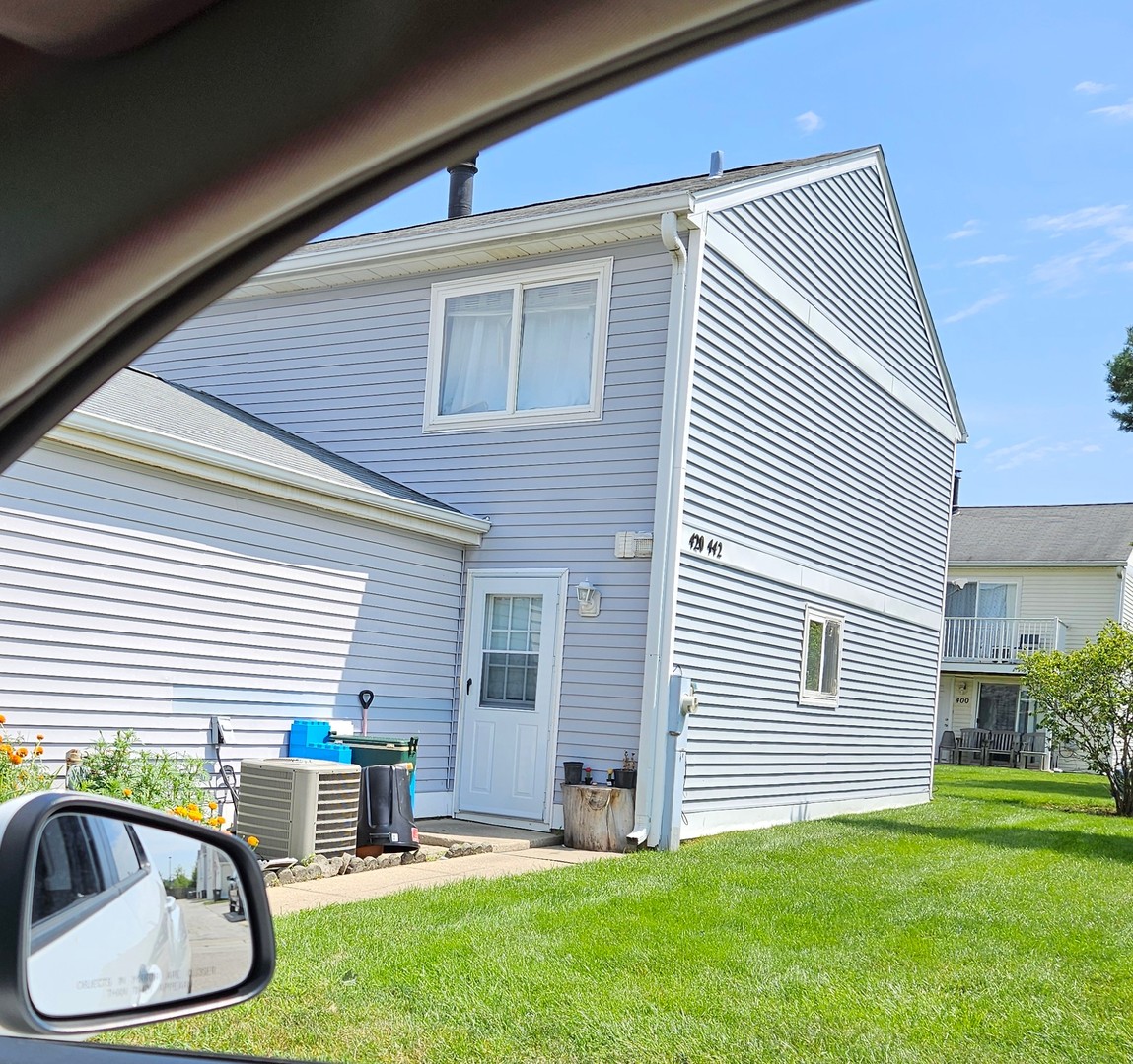 a house view with a seating space and garden view