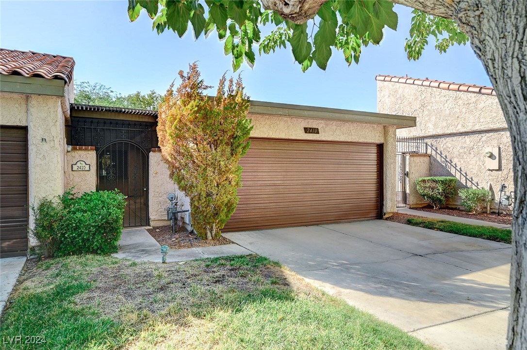 2-car garage with separate door on side to enter A