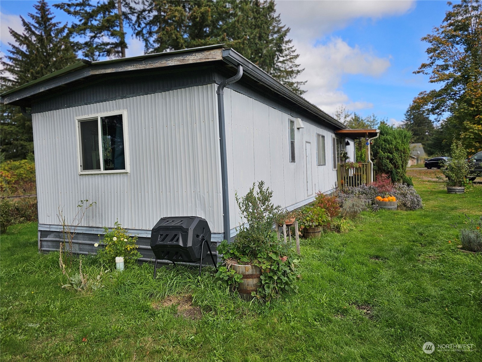 a backyard of a house with seating space