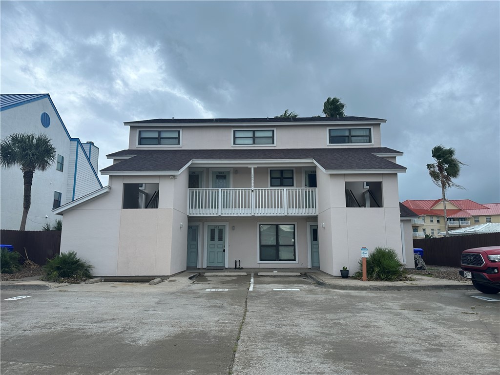 a view of house with a street