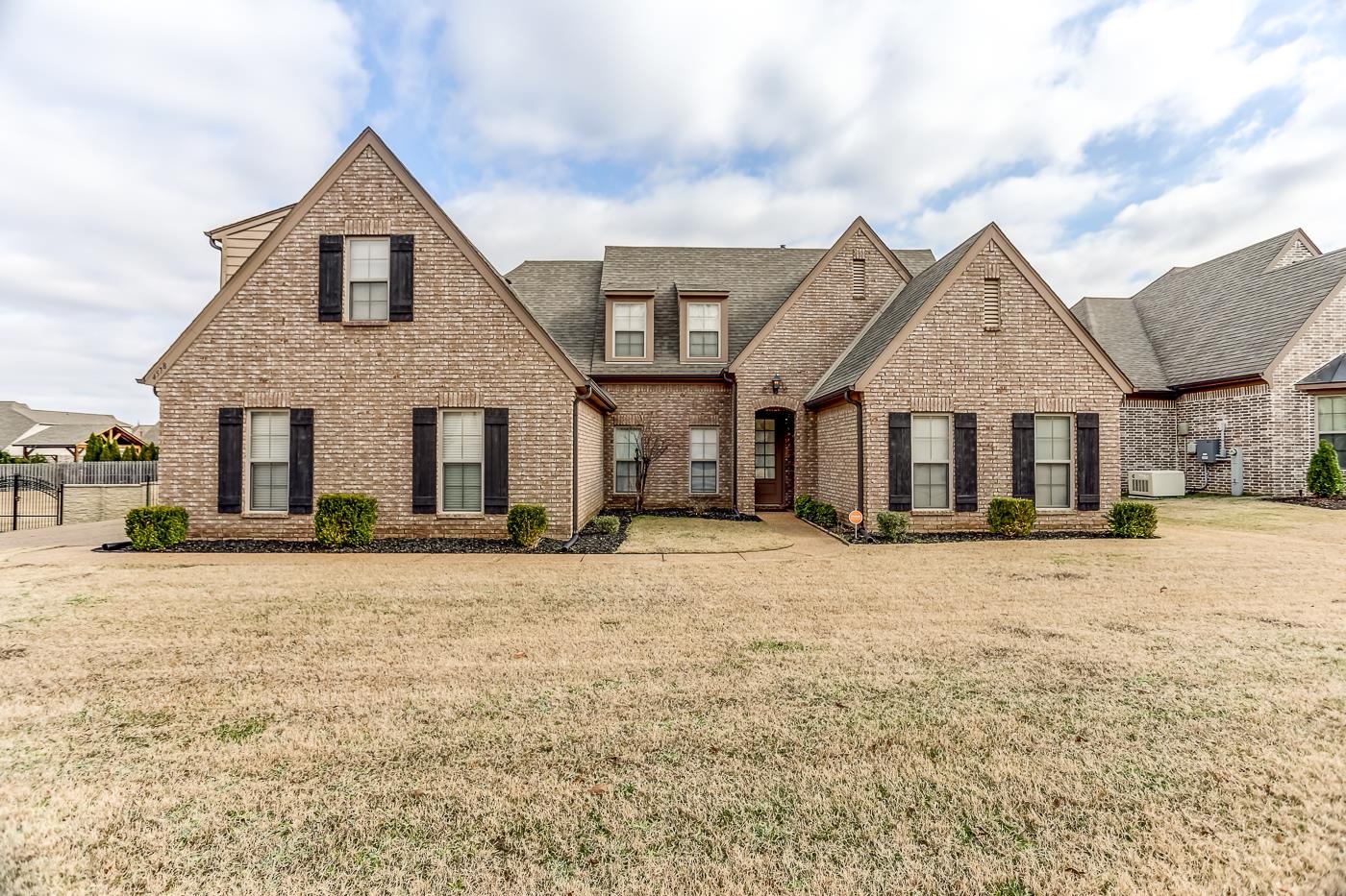 View of front of property with a front yard