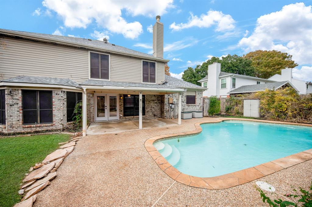 front view of a house with swimming pool