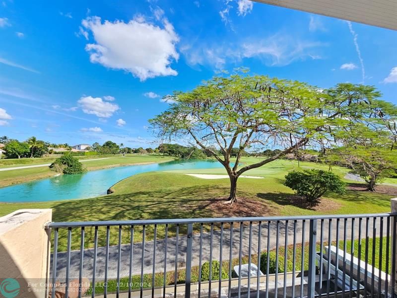 a view of a lake from a balcony