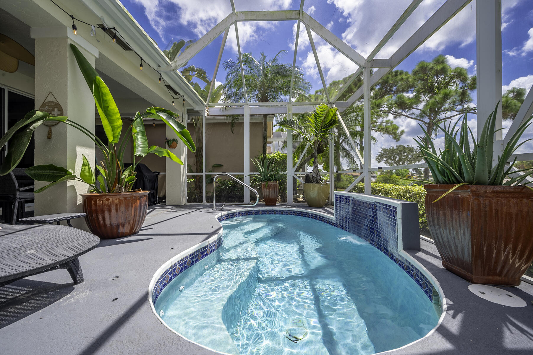 a view of a swimming pool with a patio