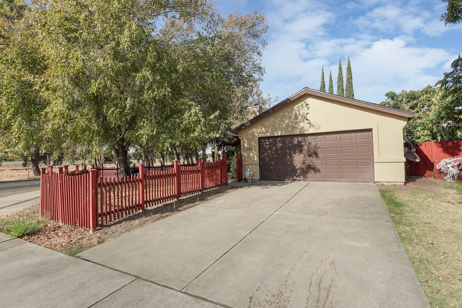 a front view of a house with a garage