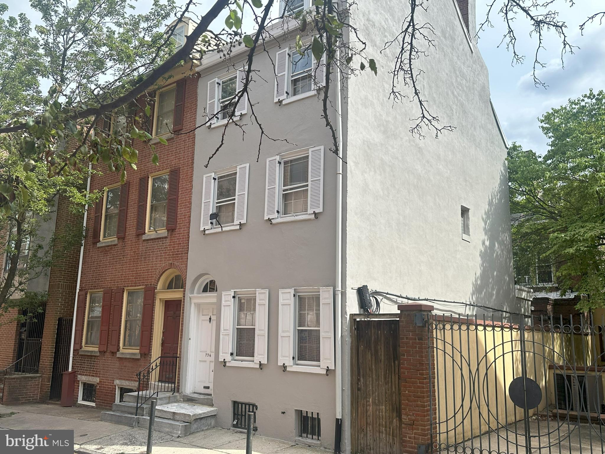 a front view of a house with parking