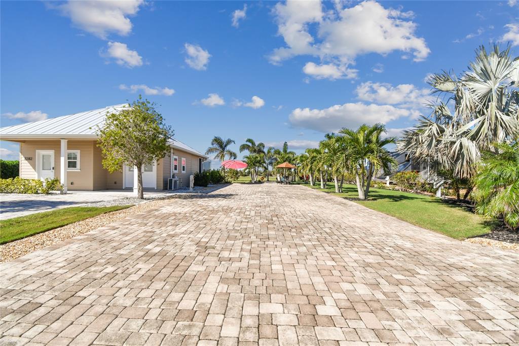 a view of a backyard of the house