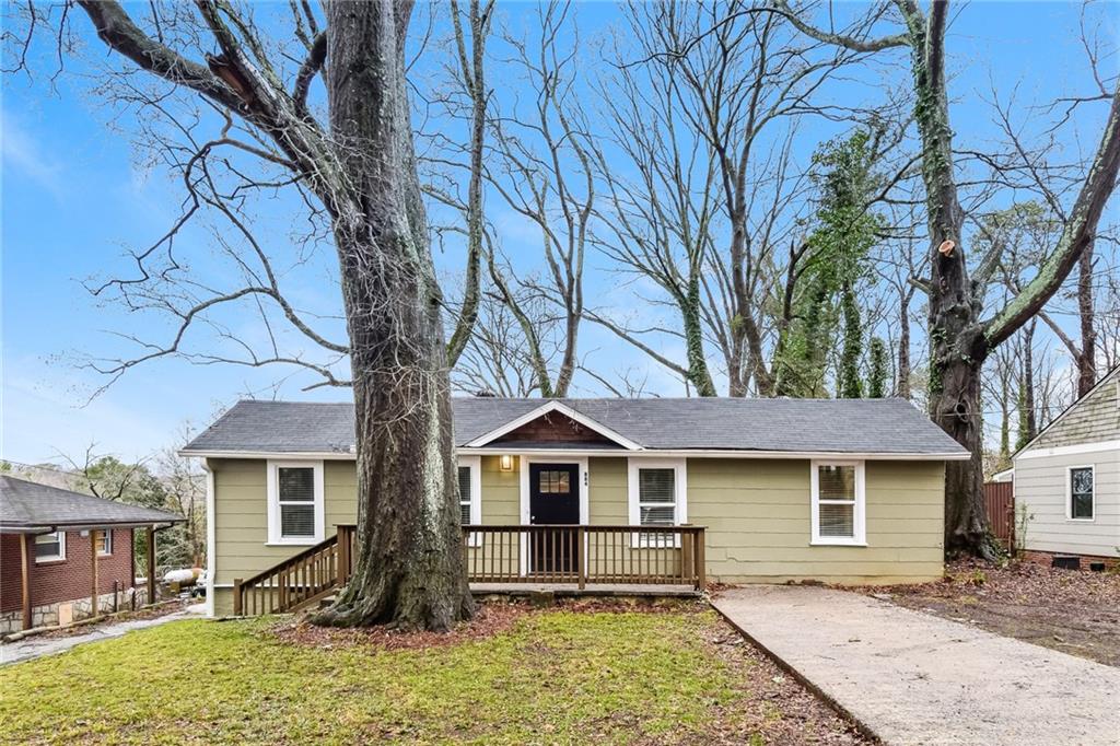 front view of a house with a yard