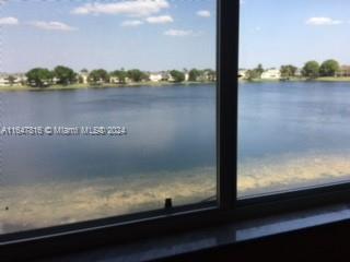 a view of a lake from a window