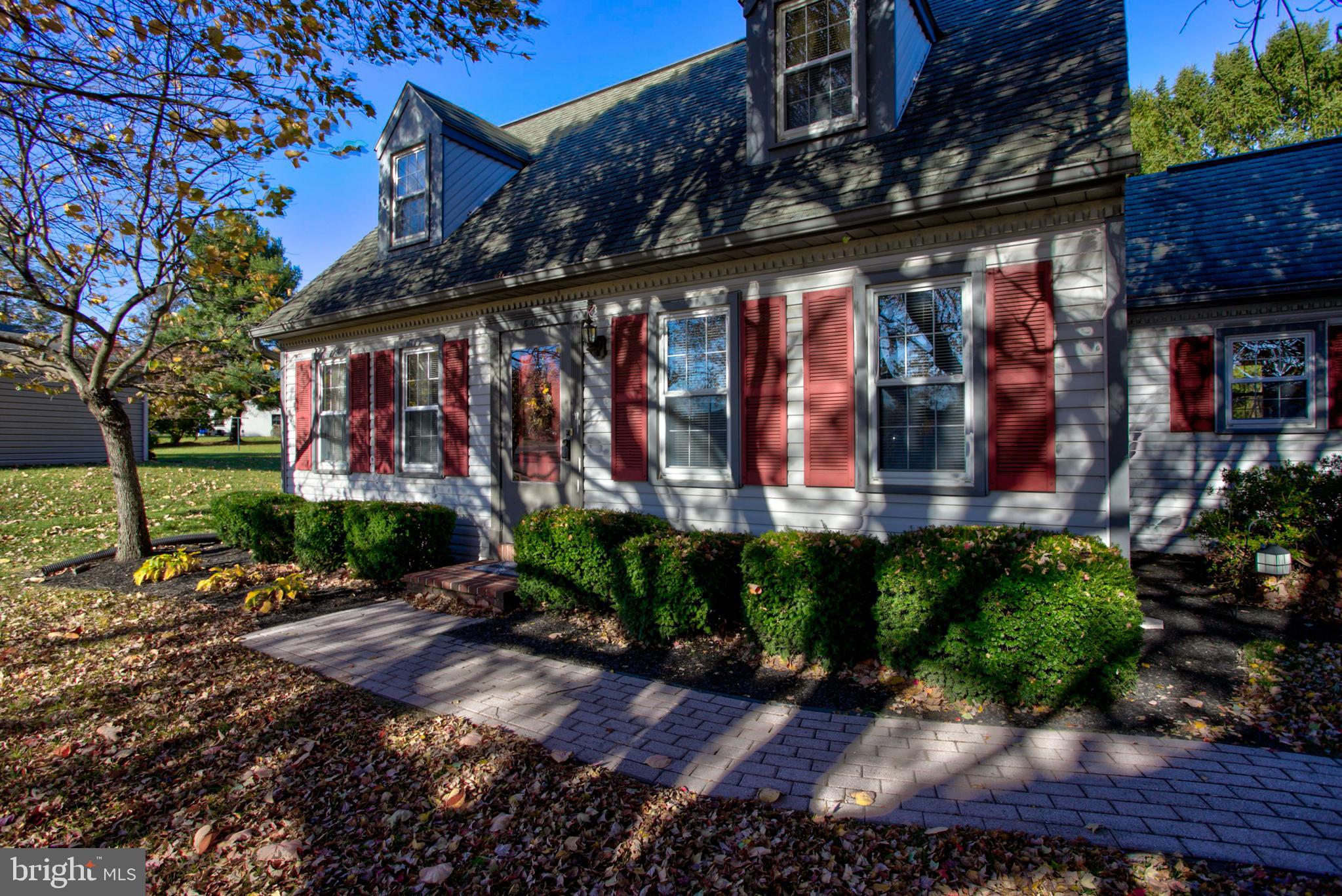 a view of a building with a yard