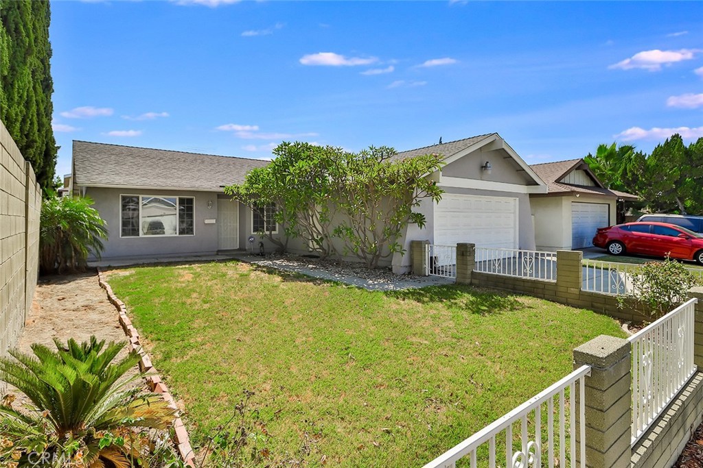 a view of house with swimming pool yard and outdoor seating