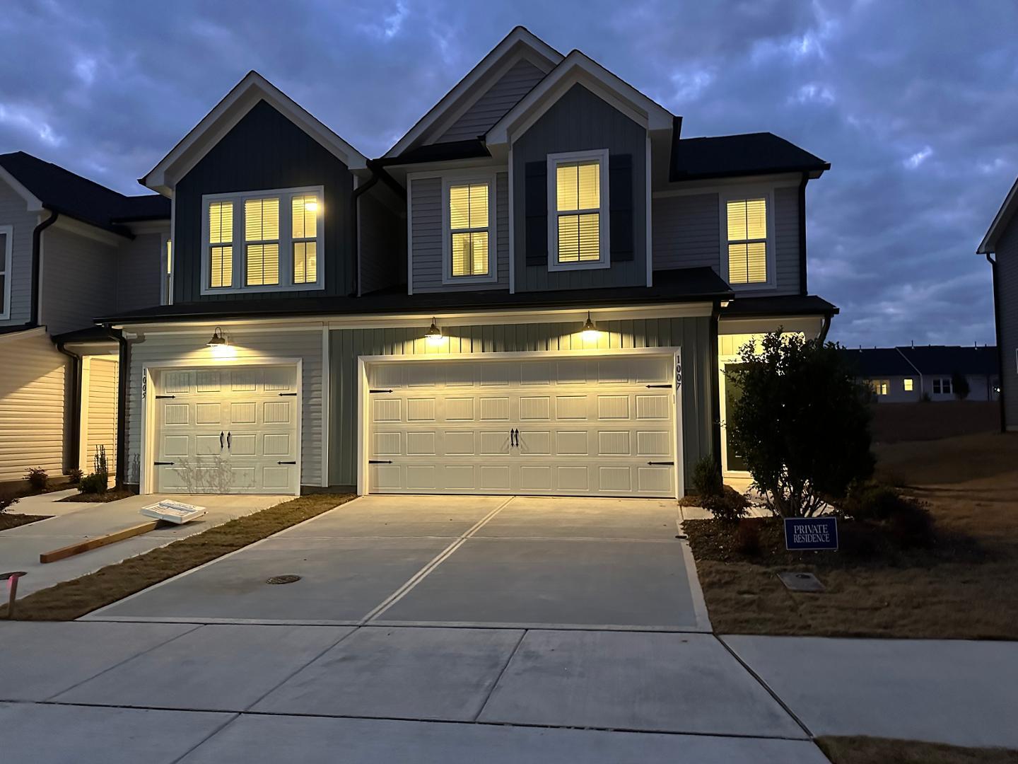 a view of a house with a garage