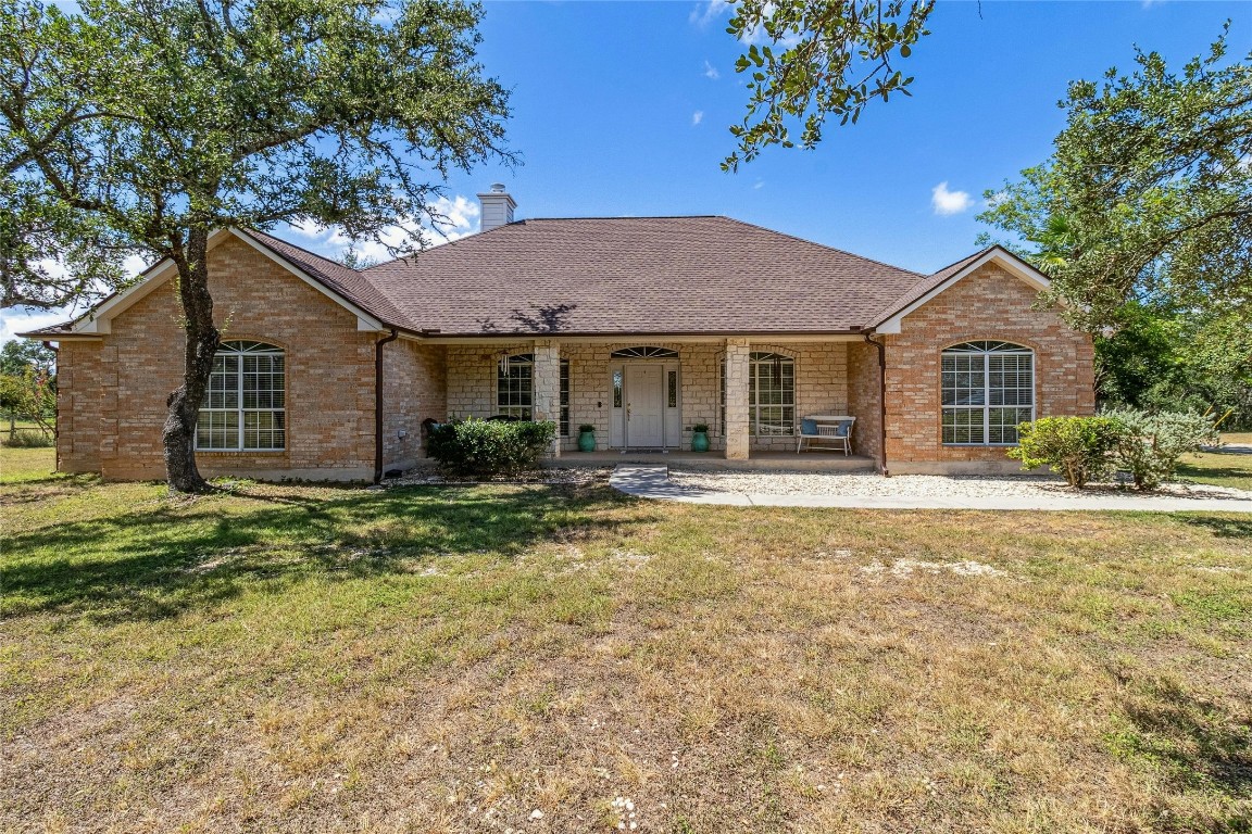 a house with trees in the background