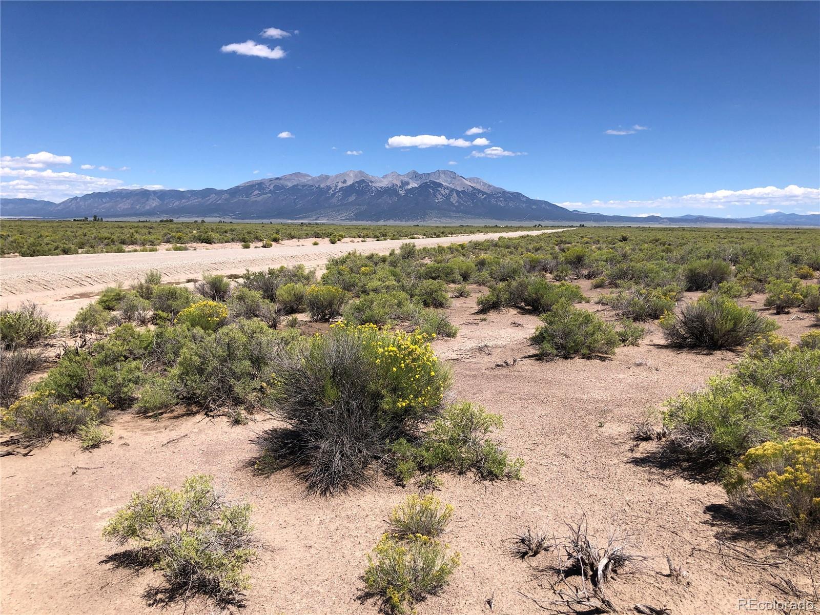 a view of a lake with mountains in the background