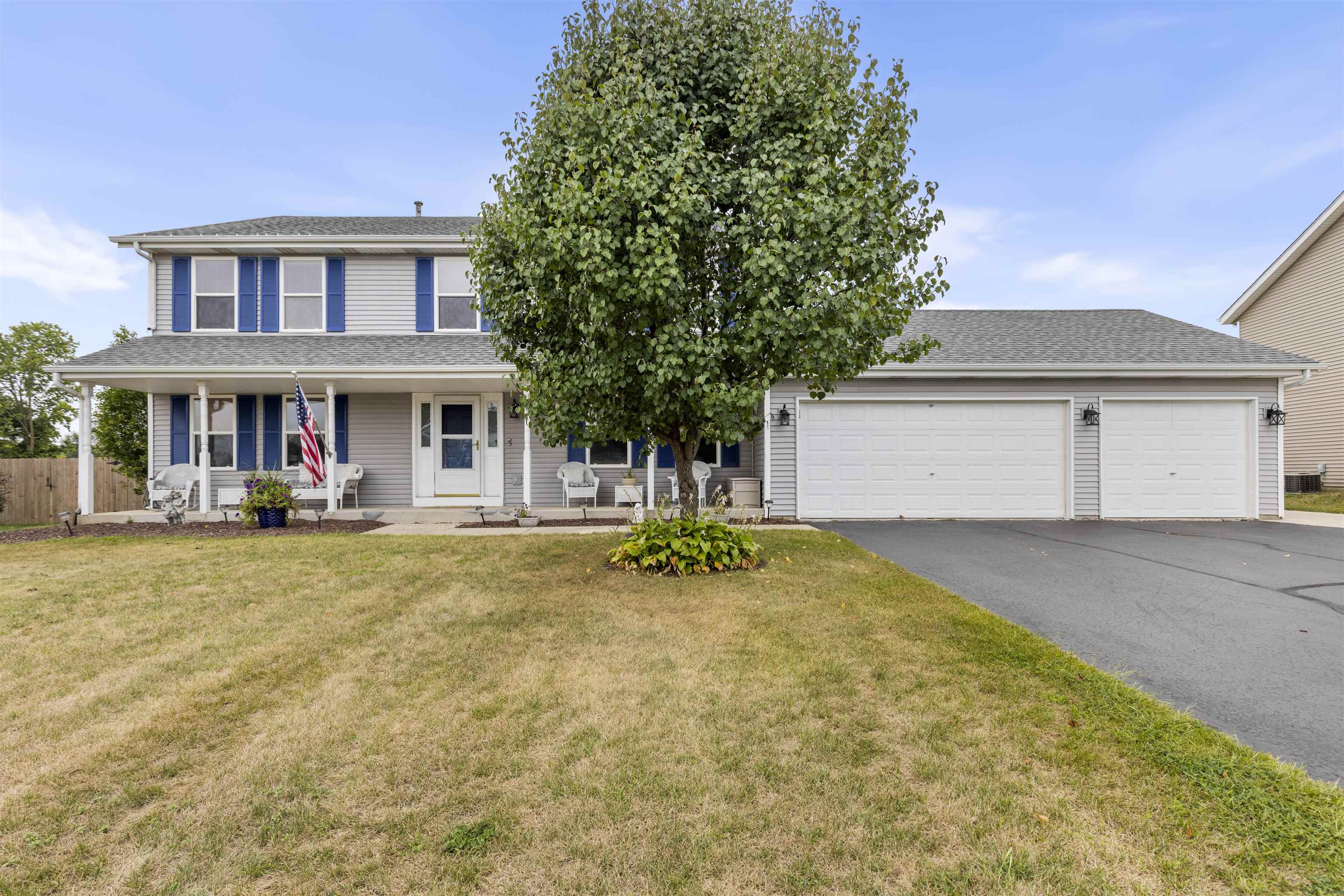 front view of a house with a yard