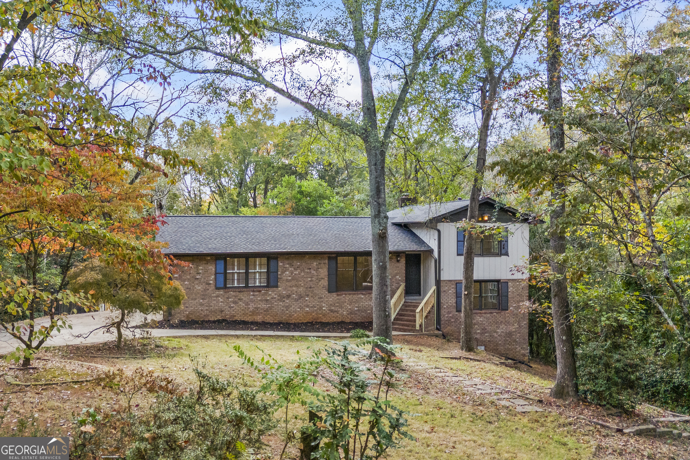 front view of a house with a yard