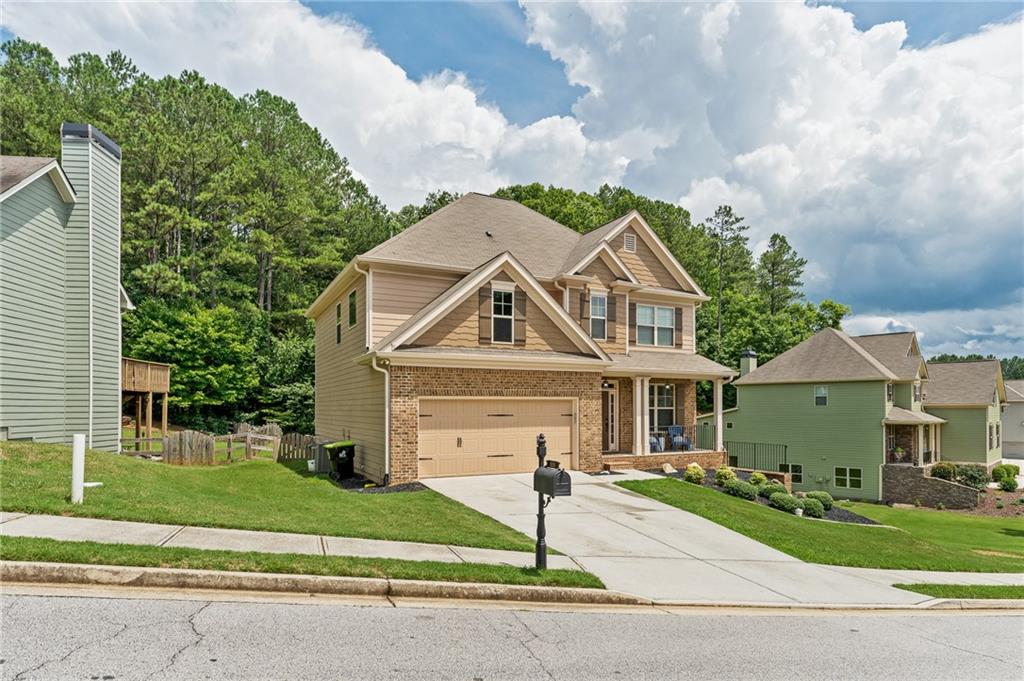 front view of a house with a small yard