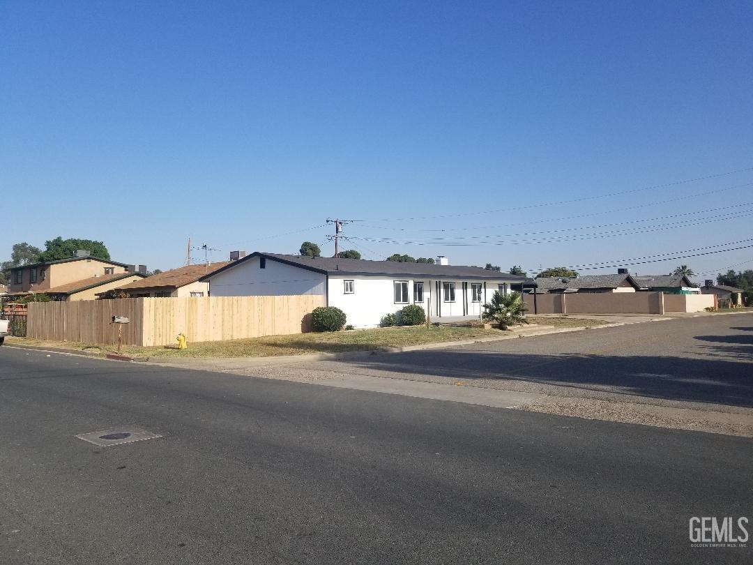 a view of a street with houses