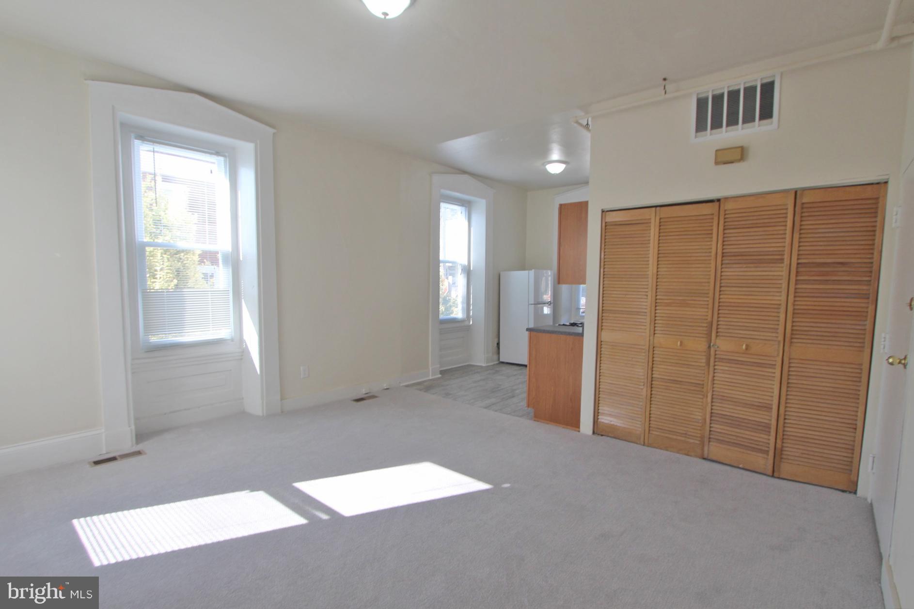 wooden floor and windows in a room