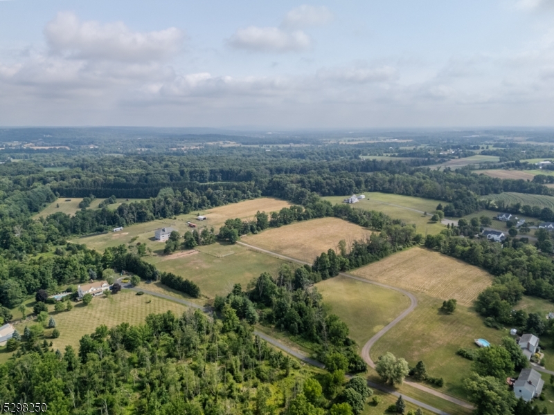 an aerial view of residential house with outdoor space