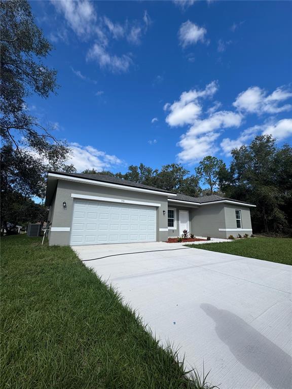 front view of house with a yard