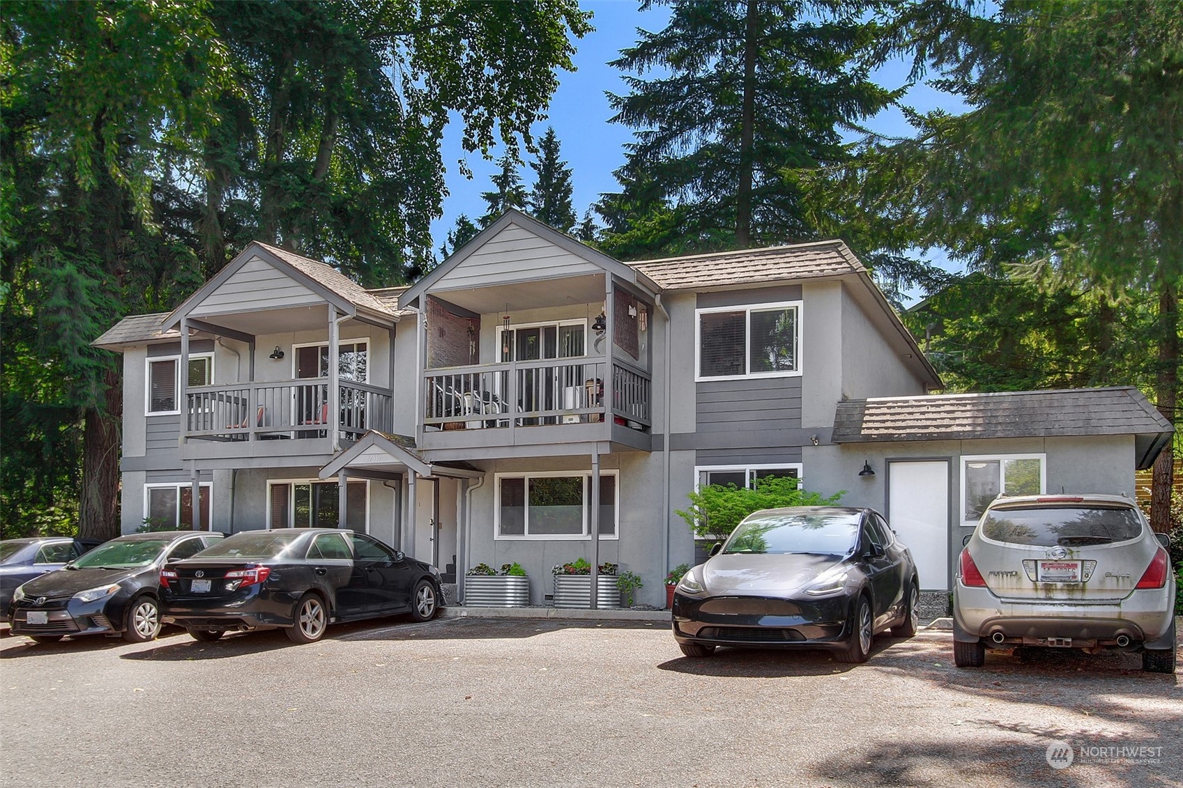 a car parked in front of a house