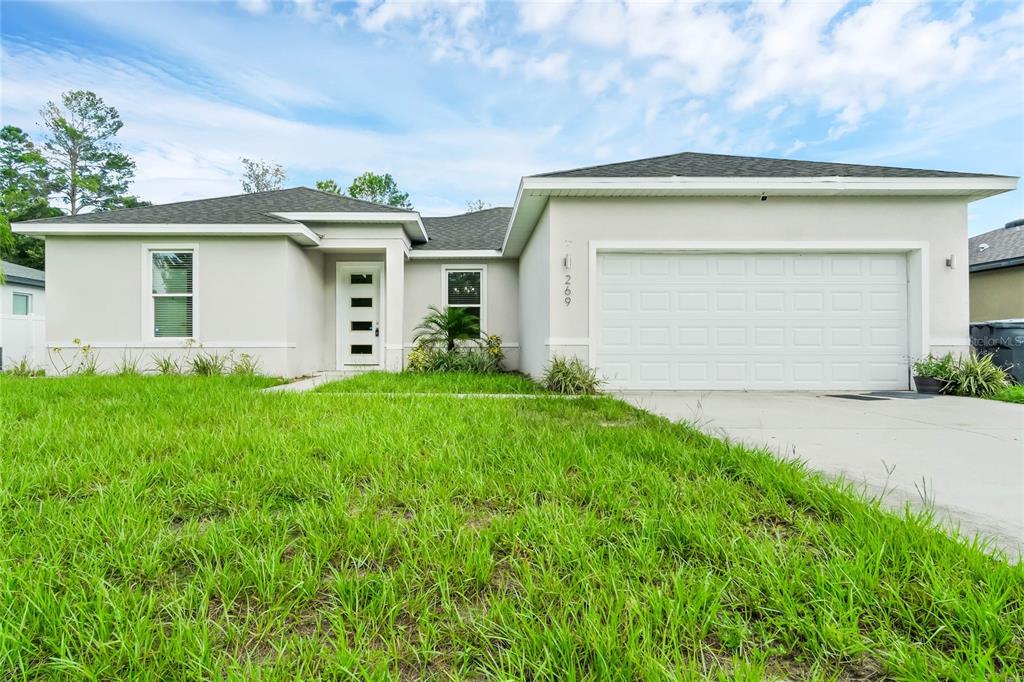 front view of house with a yard