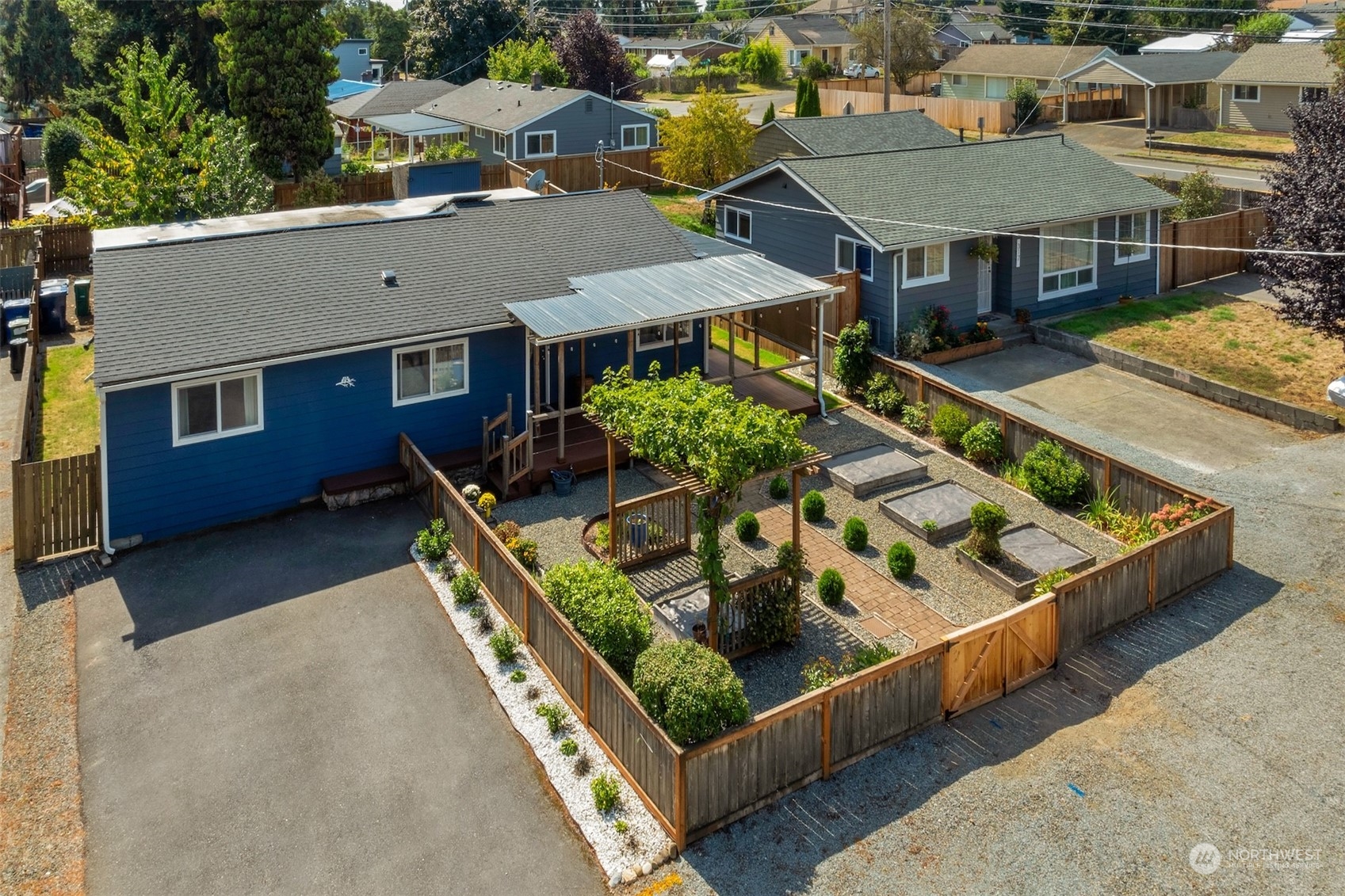 an aerial view of a house having patio