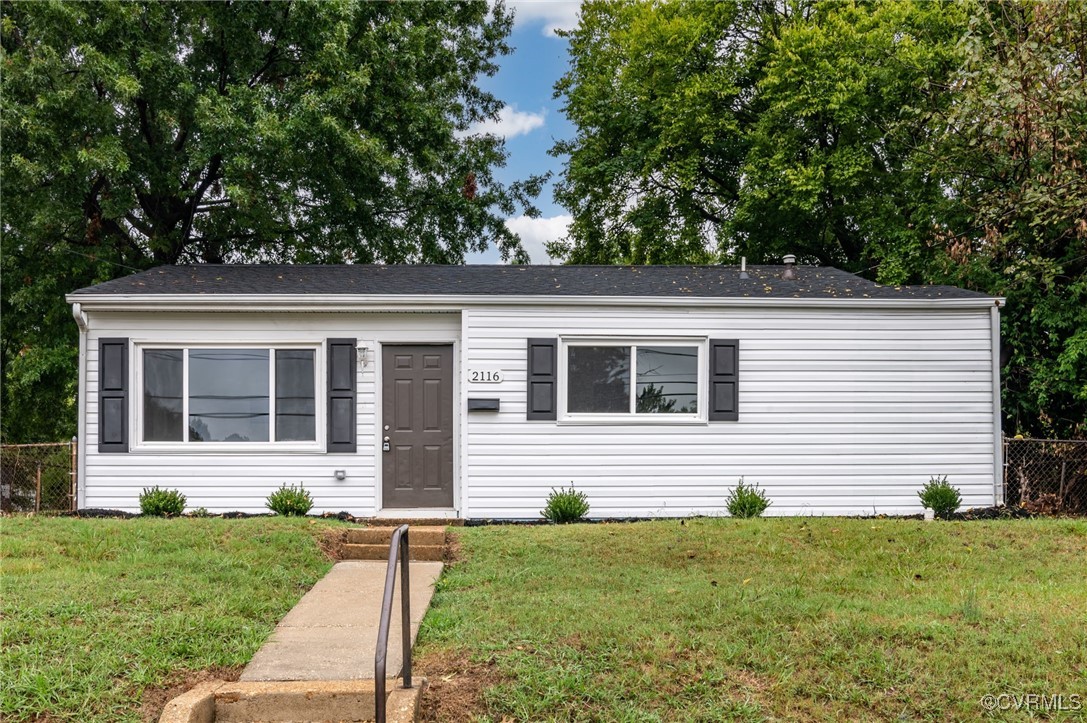 front view of house with a yard