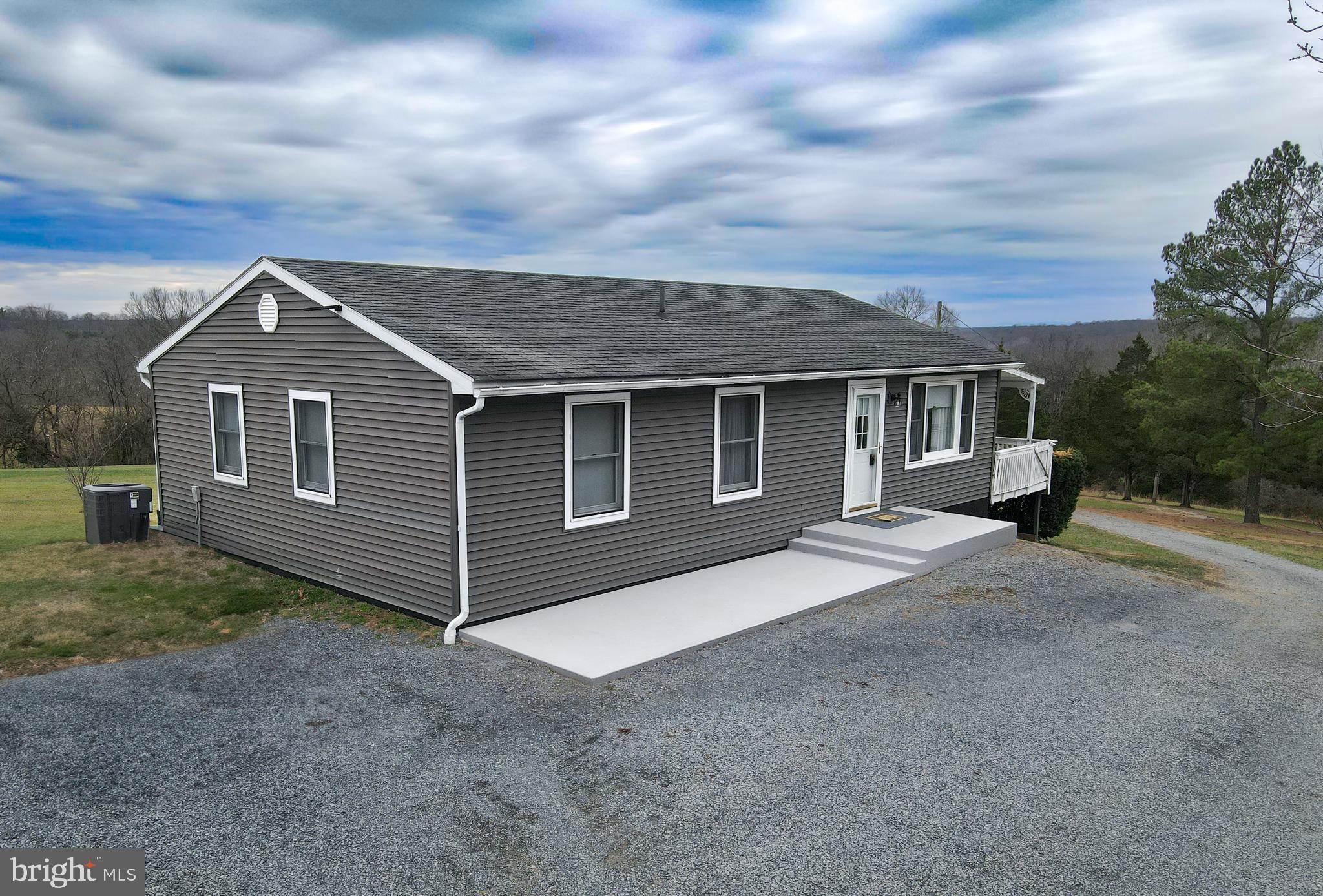 a front view of a house with a space